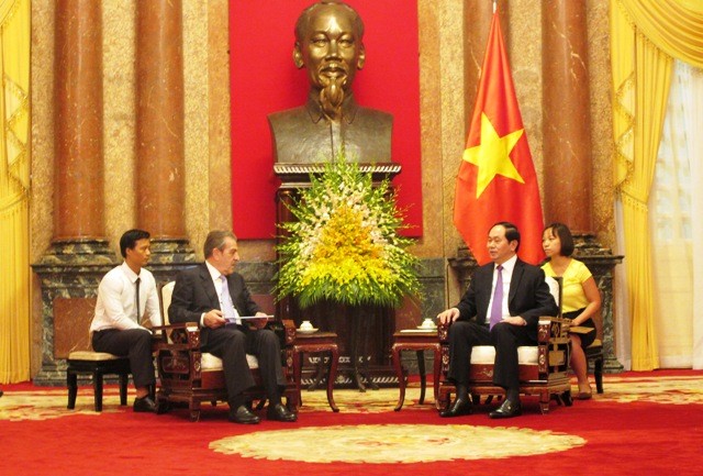 Le président Tran Dai Quang reçoit l’ancien président chilien - ảnh 1